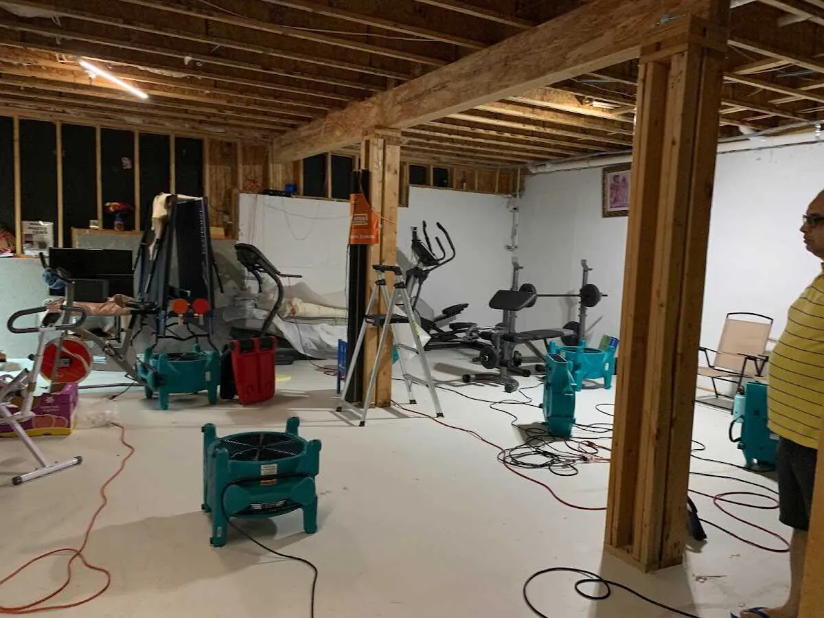 Basement drying equipment setup for Contents Cleaning & Restoration in Massena