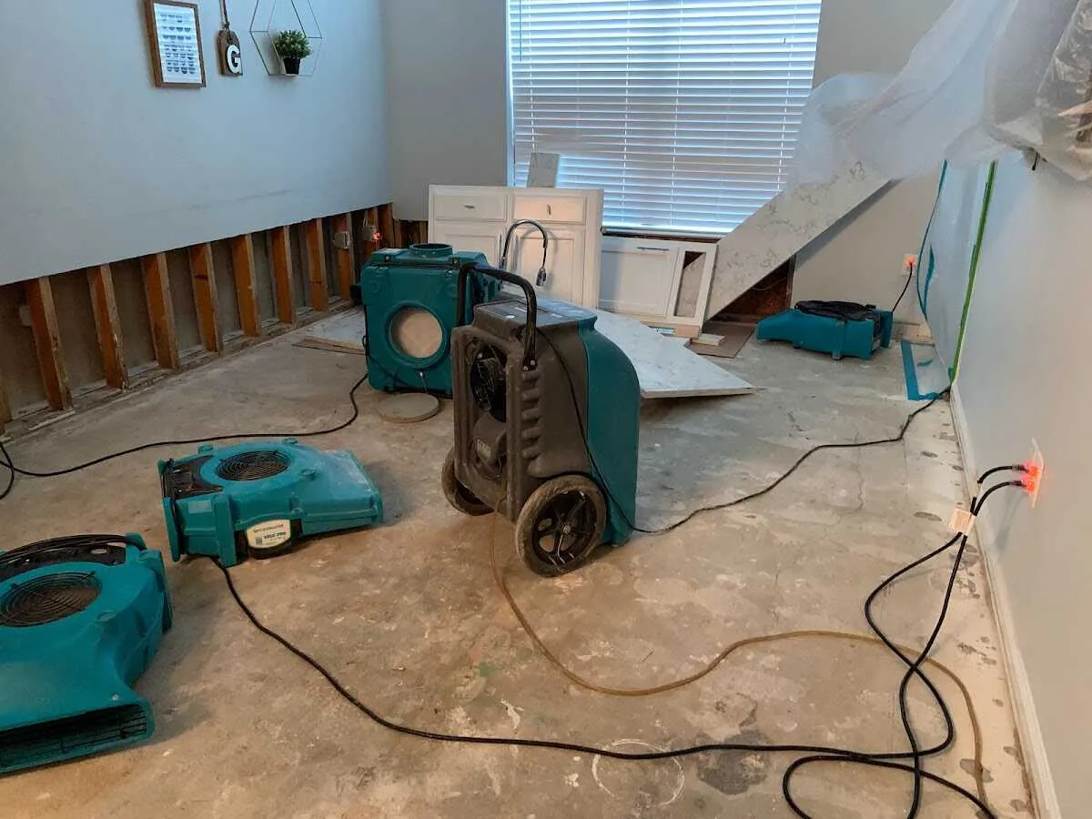 Dehumidifier in flood-cut room for Water Extraction & Removal in Massena